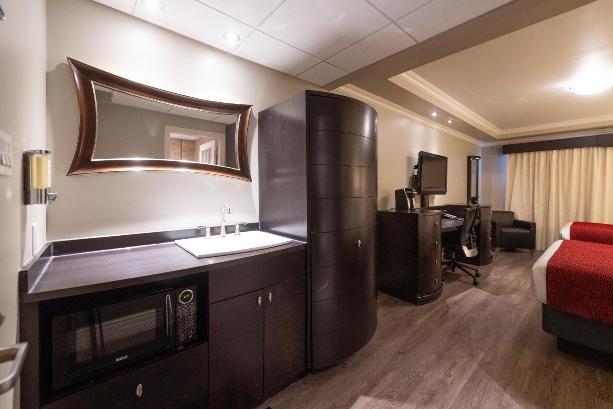 Hotel & Suites Le Dauphin ดรัมมอนวิลล์ ภายนอก รูปภาพ
