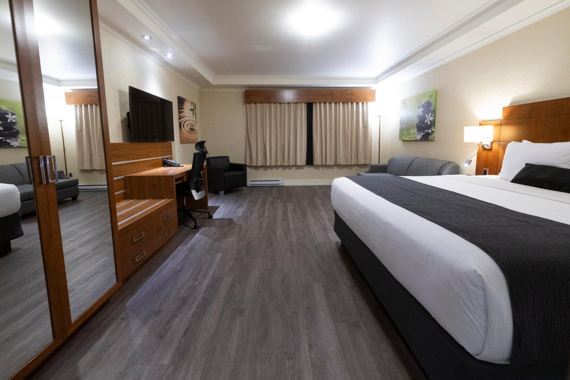 Hotel & Suites Le Dauphin ดรัมมอนวิลล์ ภายนอก รูปภาพ