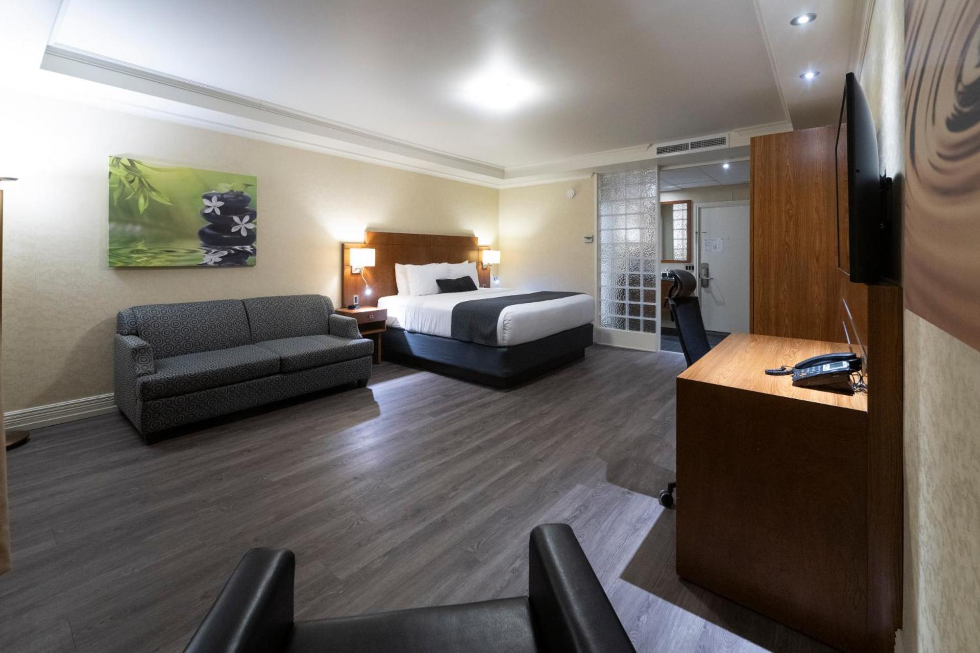 Hotel & Suites Le Dauphin ดรัมมอนวิลล์ ภายนอก รูปภาพ